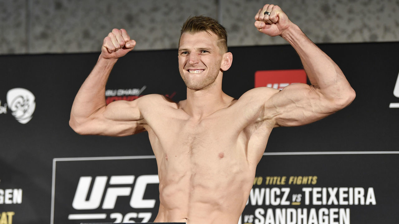 ABU DHABI, UNITED ARAB EMIRATES - OCTOBER 29: Dan Hooker of New Zealand poses on the scale during the UFC 267 official weigh-in at Hilton Abu Dhabi Yas Island on October 29, 2021 in Abu Dhabi, United Arab Emirates.