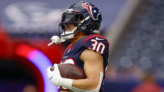 HOUSTON, TX - OCTOBER 31: Houston Texans running back Phillip Lindsay (30) before the game between the Los Angeles Rams and the Houston Texans at NRG Stadium on October 31, 2021 in Houston, Texas.
