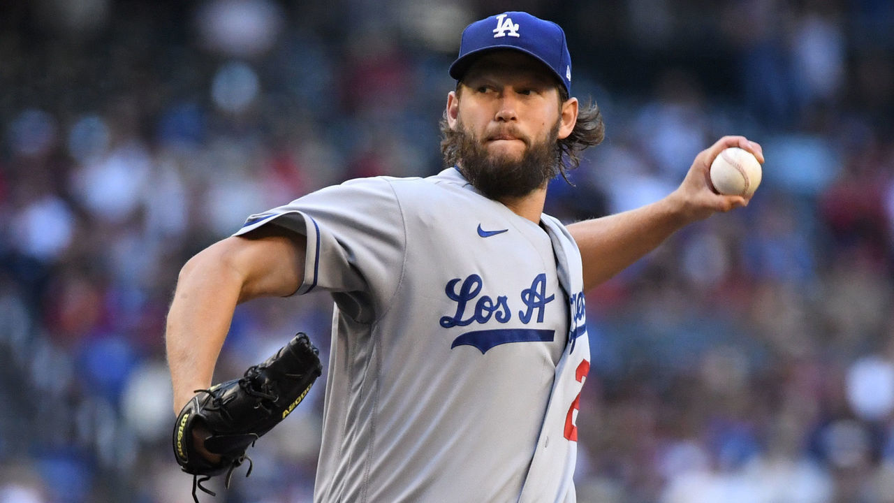 PHOENIX, ARIZONA - SEPTEMBER 25: Clayton Kershaw #22 of the Los Angeles Dodgers delivers a pitch against the Arizona Diamondbacks at Chase Field on September 25, 2021 in Phoenix, Arizona.
