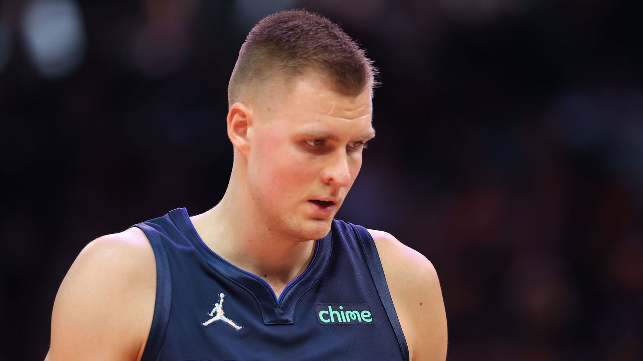 PHOENIX, ARIZONA - NOVEMBER 17: Kristaps Porzingis #6 of the Dallas Mavericks walks up-court during the first half of the NBA game against the Phoenix Suns at Footprint Center on November 17, 2021 in Phoenix, Arizona.