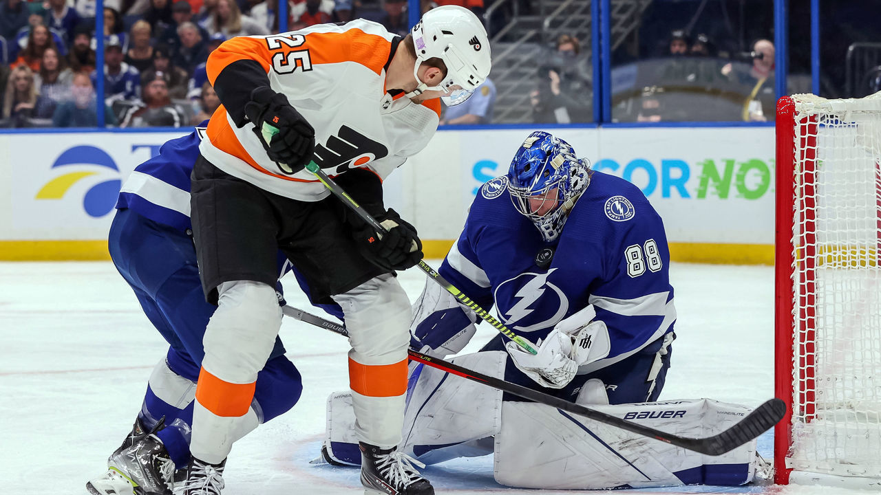 TAMPA, FL - NOVMEBER 23: Andrei Vasilevskiy #88 of the Tampa Bay Lightning makes a save against James van Riemsdyk #25 of the Philadelphia Flyers during the third period at the Amalie Arena on November 23, 2021 in Tampa, Florida.