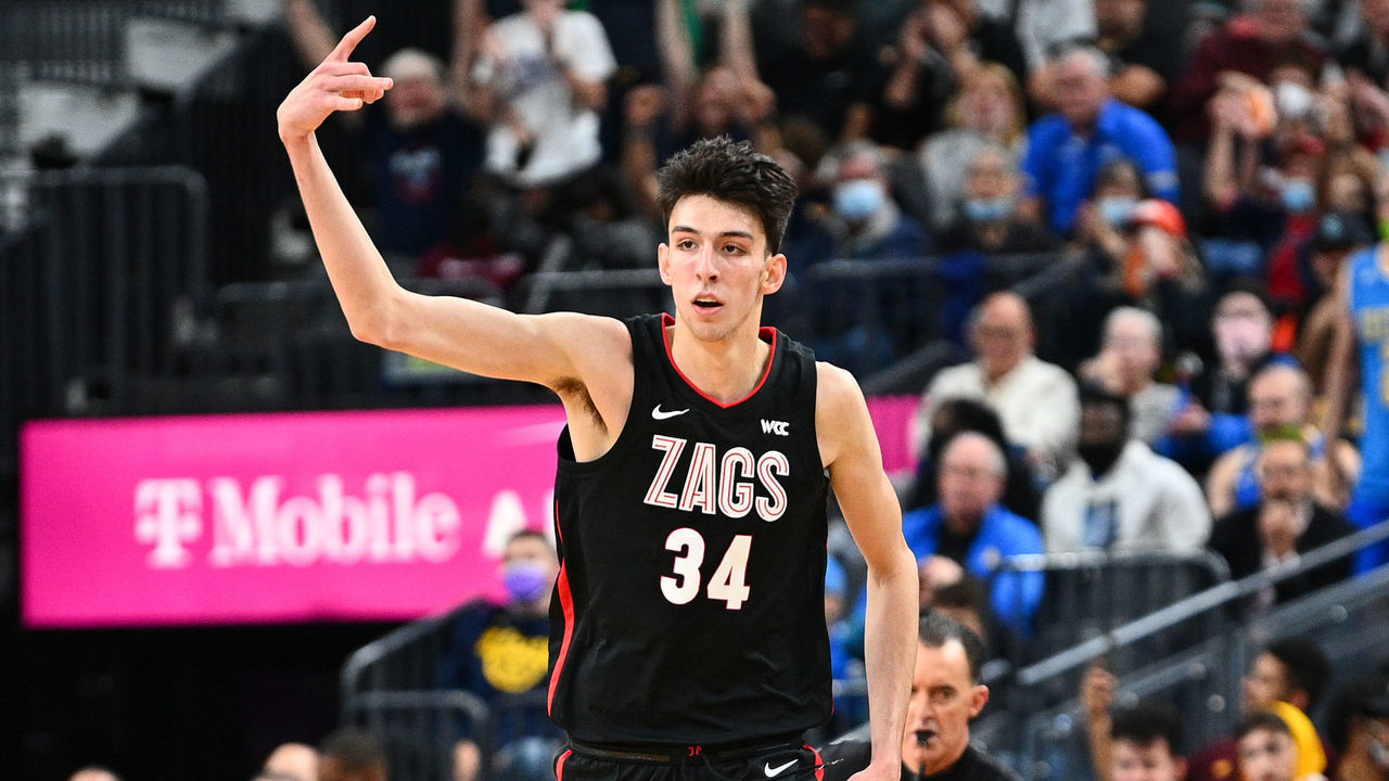 LAS VEGAS, NV - NOVEMBER 23: Gonzaga forward Chet Holmgren (34) celebrates a three point basket as UCLA Bruins guard Johnny Juzang (3) looks on during the Empire Classic tournament college basketball game between the Gonzaga Bulldogs and the UCLA Bruins on November 23, 2021, at the T-Mobile Arena in Las Vegas, NV.