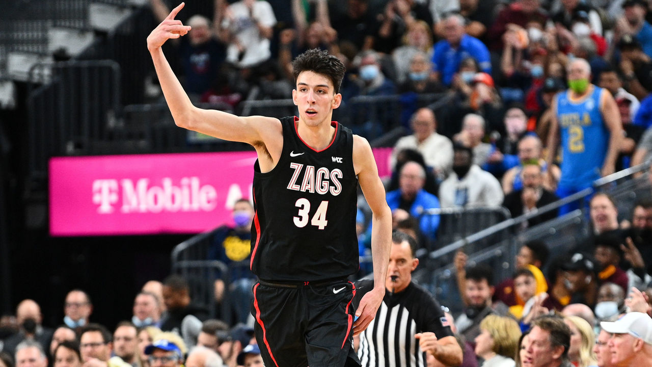 LAS VEGAS, NV - NOVEMBER 23: Gonzaga forward Chet Holmgren (34) celebrates a three point basket as UCLA Bruins guard Johnny Juzang (3) looks on during the Empire Classic tournament college basketball game between the Gonzaga Bulldogs and the UCLA Bruins on November 23, 2021, at the T-Mobile Arena in Las Vegas, NV.