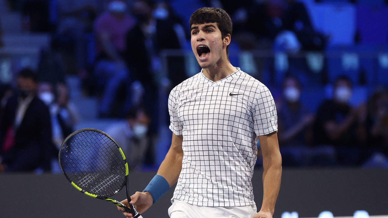 MILAN, ITALY - NOVEMBER 13: Carlos Alcaraz of Spain celebrates at match point in the final match against Sebastian Korda of USA during Day Five of the Next Gen ATP Finals at Palalido Stadium on November 13, 2021 in Milan, Italy.