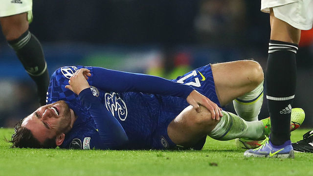 LONDON, ENGLAND - NOVEMBER 23: Ben Chilwell of Chelsea lies injured during the UEFA Champions League group H match between Chelsea FC and Juventus at Stamford Bridge on November 23, 2021 in London, England.