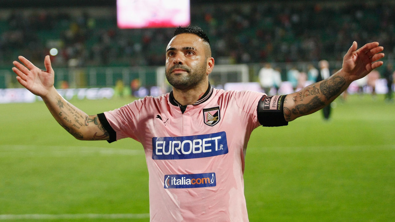 PALERMO, ITALY - MAY 19: Fabrizio Miccoli of Palermo salutes his fans after the Serie A match between US Citta di Palermo and Parma FC at Stadio Renzo Barbera on May 19, 2013 in Palermo, Italy.
