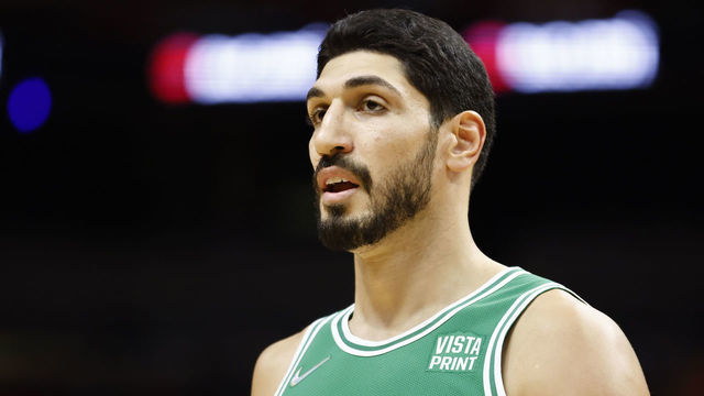 MIAMI, FLORIDA - OCTOBER 15: Enes Kanter #11 of the Boston Celtics looks on against the Miami Heat during a preseason game at FTX Arena on October 15, 2021 in Miami, Florida.