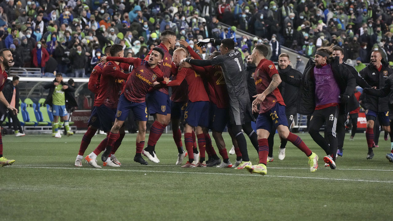 SEATTLE, WA - NOVEMBER 23: Real Salt Lake team members celebrate their overtime win after a round one MLS playoff match between Real Salt Lake and the Seattle Sounders on November 23, 2021 at Lumen Field in Seattle, WA.