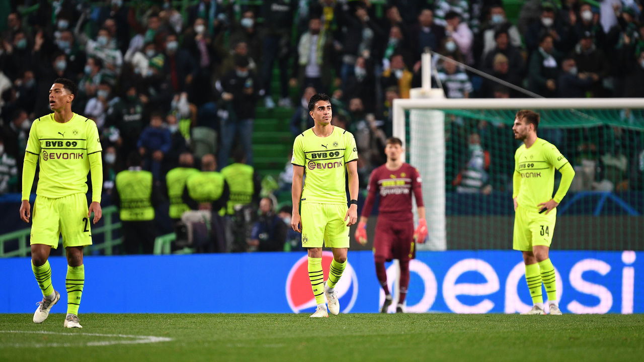 LISBON, PORTUGAL - NOVEMBER 24: Reinier of Borussia Dortmund (C) looks dejected after their side concede a second goal scored by Pedro Goncalves of Sporting CP (not pictured) during the UEFA Champions League group C match between Sporting CP and Borussia Dortmund at Estadio Jose Alvalade on November 24, 2021 in Lisbon, Portugal.