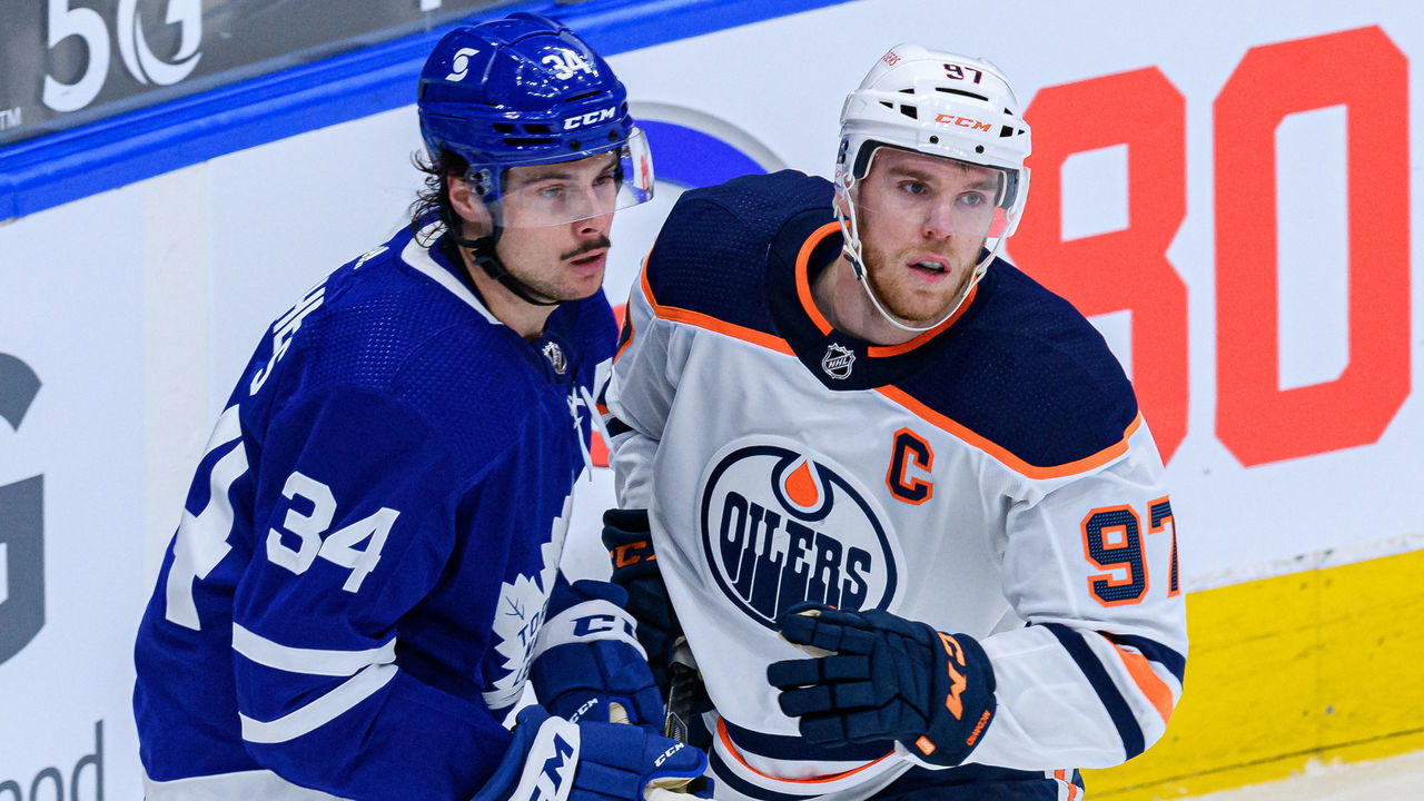 TORONTO, ON - MARCH 29: Toronto Maple Leafs Center Auston Matthews (34) and Edmonton Oilers Center Connor McDavid (97) react during the second period of the NHL regular season game between the Edmonton Oilers and the Toronto Maple Leafs on March 29, 2021, at Scotiabank Arena in Toronto, ON, Canada.