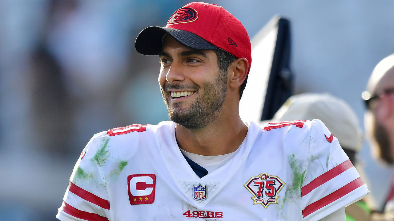 JACKSONVILLE, FLORIDA - NOVEMBER 21: Jimmy Garoppolo #10 of the San Francisco 49ers reacts after defeating the Jacksonville Jaguars 30-10 at TIAA Bank Field on November 21, 2021 in Jacksonville, Florida.