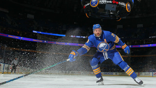 BUFFALO, NY - NOVEMBER 22: Zemgus Girgensons #28 of the Buffalo Sabres defends against the Columbus Blue Jackets during an NHL game on November 22, 2021 at KeyBank Center in Buffalo, New York.