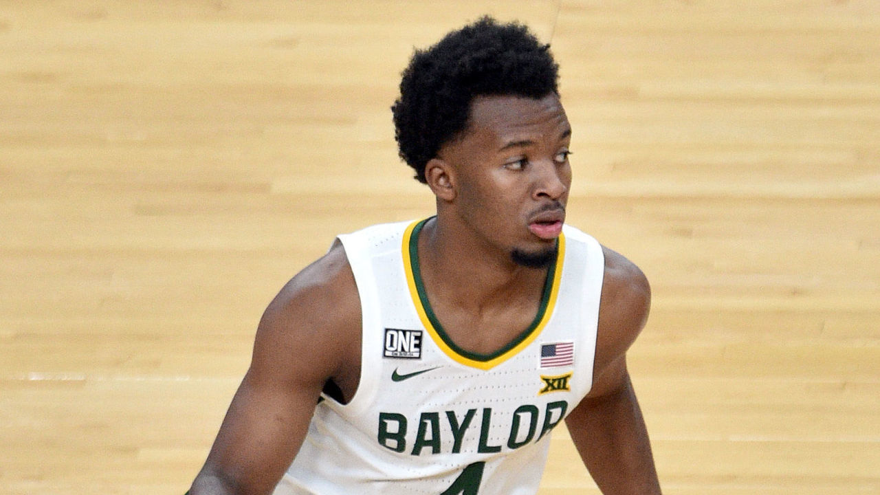 LAS VEGAS, NEVADA - NOVEMBER 28: L.J. Cryer #4 of the Baylor Bears drives the ball against the Louisiana Ragin' Cajuns in the first half of their game during the #VegasBubble basketball tournament at T-Mobile Arena on November 28, 2020 in Las Vegas, Nevada. Baylor won 112-82.