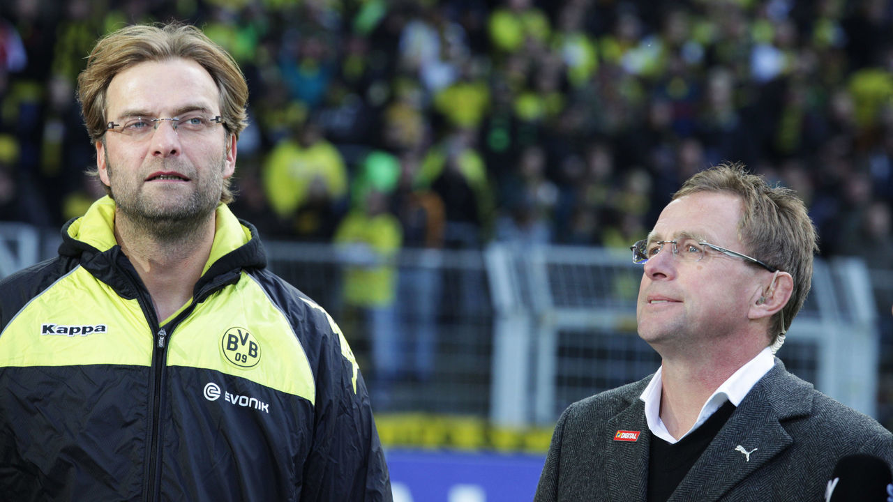 RESTRICTIONS / EMBARGO - ONLINE CLIENTS MAY USE UP TO SIX IMAGES DURING EACH MATCH WITHOUT THE AUTHORISATION OF THE DFL. NO MOBILE USE DURING THE MATCH AND FOR A FURTHER TWO HOURS AFTERWARDS IS PERMITTED WITHOUT THE AUTHORISATION OF THE DFL. Dortmund's head coach Juergen Klopp (L) and Hoffenheim's head coach Ralf Rangnick attend the German first division Bundesliga football Borrusia Dortmund vs 1899 Hoffenheim in the western German city of Dortmund on October 24, 2010. AFP PHOTO / BARTEK WRZESNIOWSKI
