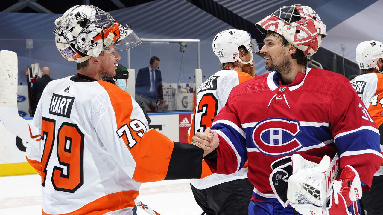 TORONTO, ONTARIO - AUGUST 21: Goaltender Carey Price #31 of the Montreal Canadiens congratulates goaltender Carter Hart #79 of the Philadelphia Flyers after the Flyers 3-2 victory to clinch the series 4-2 after Game Six of the Eastern Conference First Round during the 2020 NHL Stanley Cup Playoffs at Scotiabank Arena on August 21, 2020 in Toronto, Ontario.