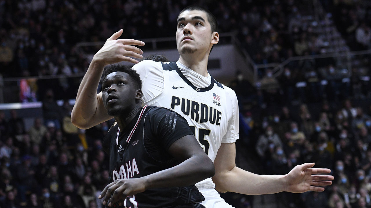WEST LAFAYETTE, IN - NOVEMBER 26: Purdue Boilermakers center Zach Edey (15) and Omaha Mavericks forward Wanjang Tut (13) vie for a rebound during the college basketball game between the Omaha Mavericks and the Purdue Boilermakers on November 26, 2021, at Mackey Arena in West Lafayette, Indiana.