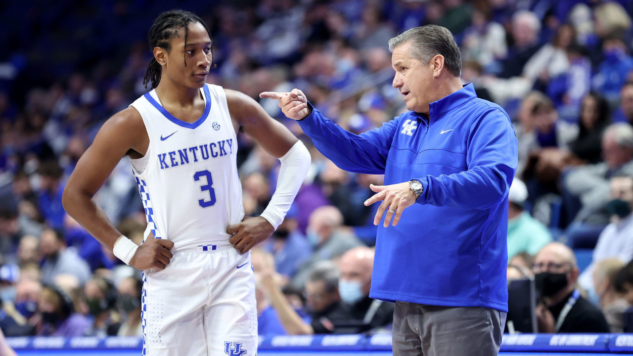 LEXINGTON, KENTUCKY - NOVEMBER 22: John Calipari the head coach of the Kentucky Wildcats gives instructions to TYTY Washington Jr #3 during the game against the Albany Great Danes at Rupp Arena on November 22, 2021 in Lexington, Kentucky.