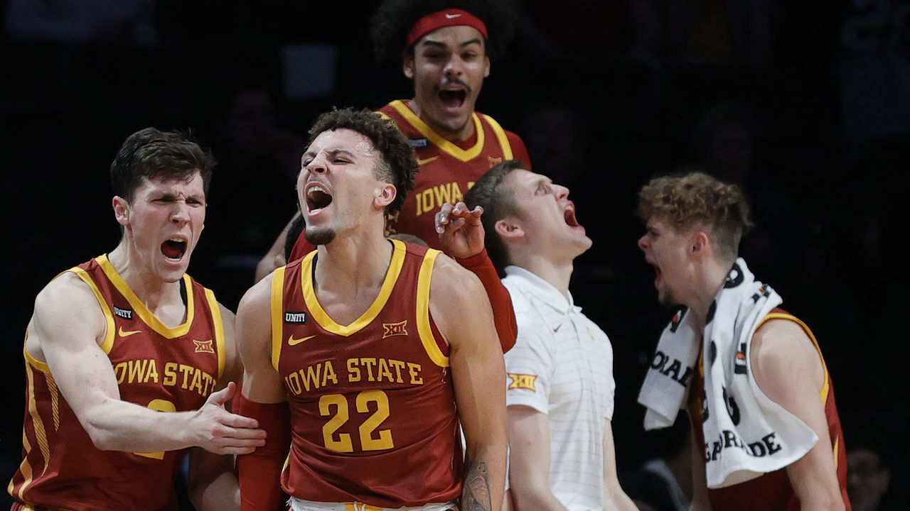 NEW YORK, NEW YORK - NOVEMBER 26: Gabe Kalscheur #22 of the Iowa State Cyclones reacts with Caleb Grill #2 after making a three-point shot during the second half against the Memphis Tigers in the NIT Season Tip-Off tournament at Barclays Center on November 26, 2021 in the Brooklyn borough of New York City. The Cyclones won 78-59.