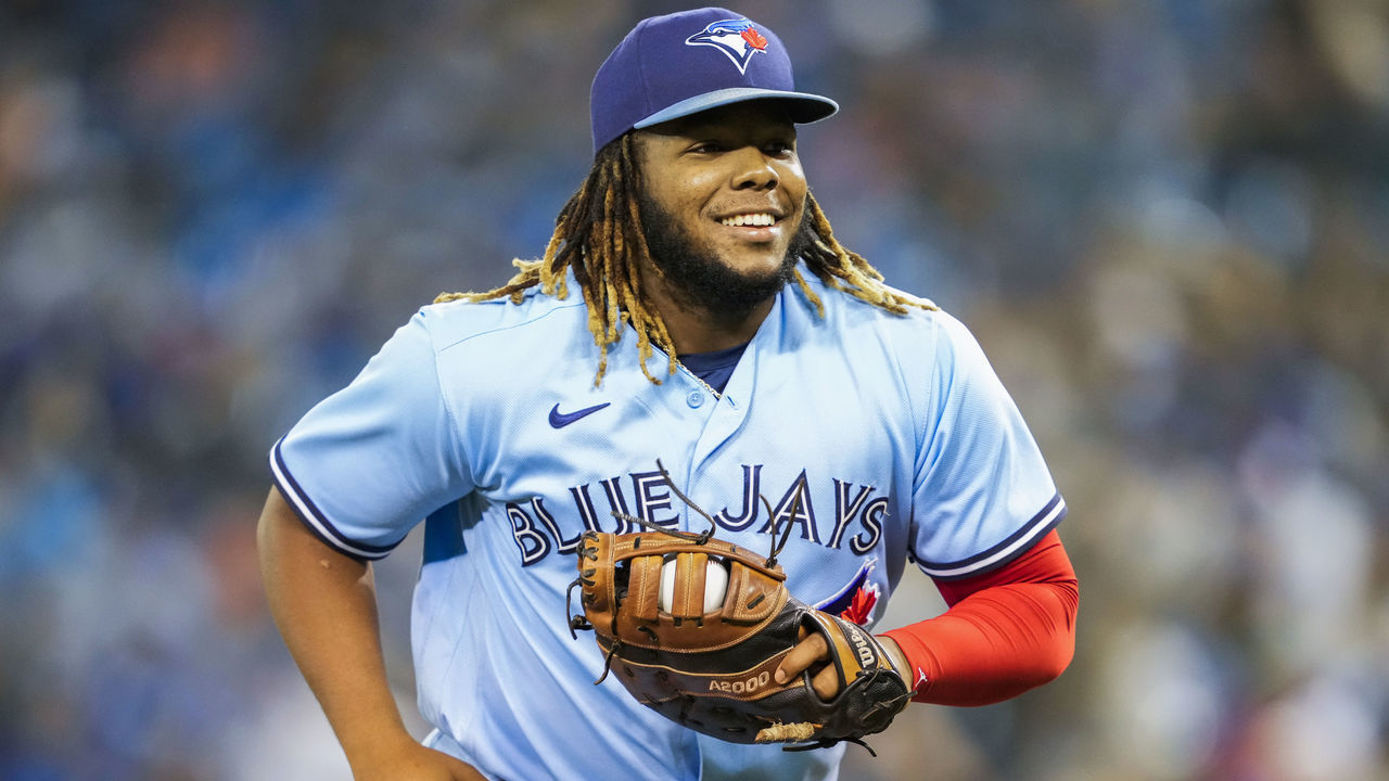 TORONTO, ONTARIO - OCTOBER 3: Vladimir Guerrero Jr. #27 of the Toronto Blue Jays smiles in break against the Baltimore Orioles during their MLB game at the Rogers Centre on October 3, 2021 in Toronto, Ontario, Canada.