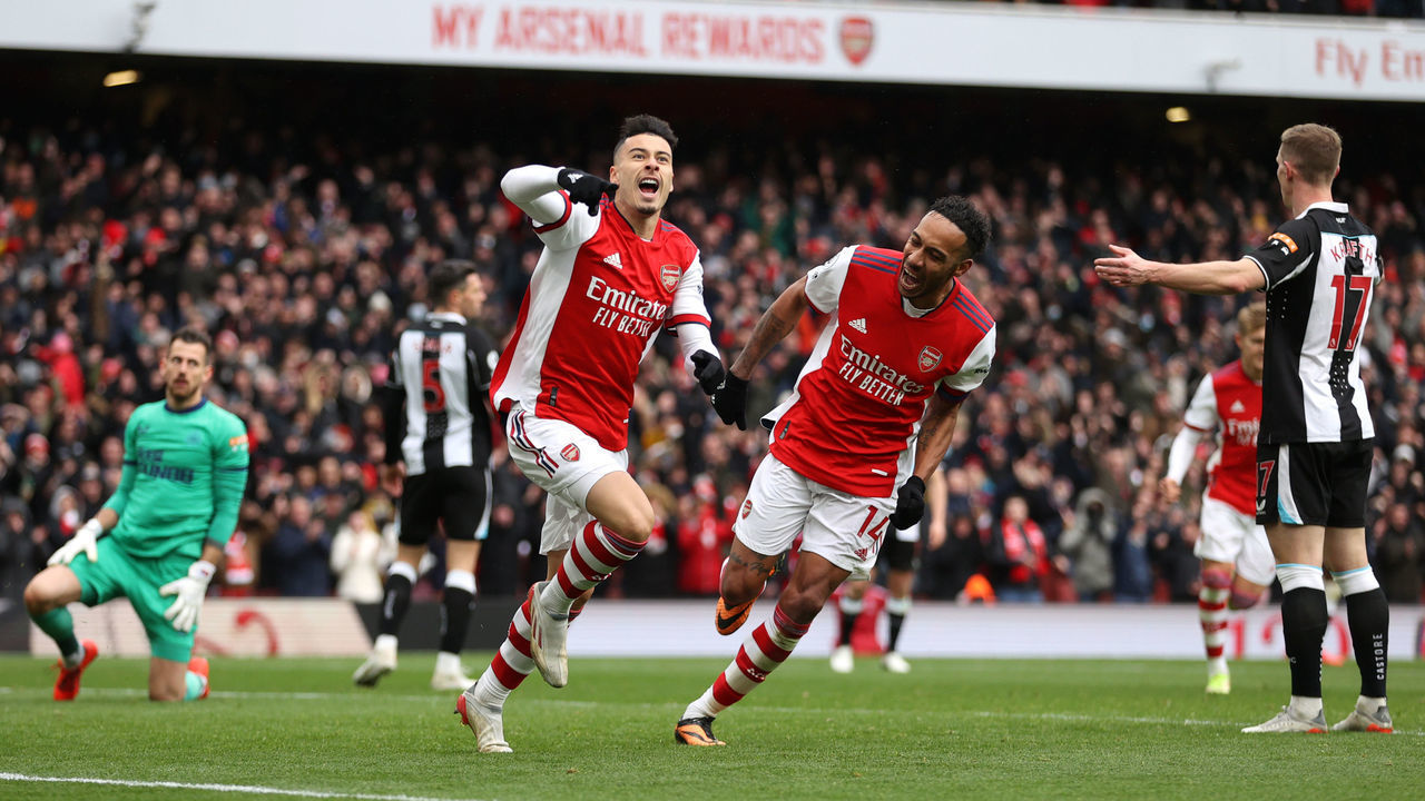 LONDON, ENGLAND - NOVEMBER 27: Gabriel Martinelli celebrates with teammate Pierre-Emerick Aubameyang of Arsenal after scoring their team's second goal during the Premier League match between Arsenal and Newcastle United at Emirates Stadium on November 27, 2021 in London, England.