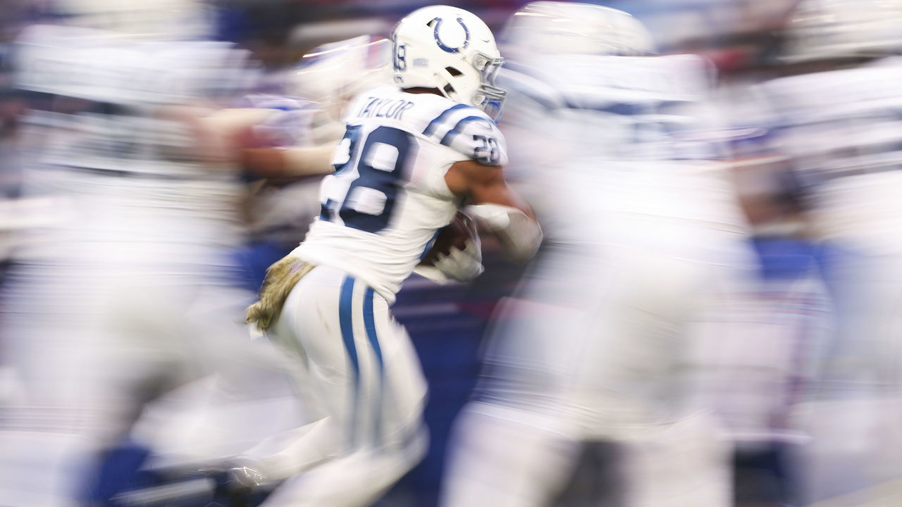 ORCHARD PARK, NEW YORK - NOVEMBER 21: Jonathan Taylor #28 of the Indianapolis Colts rushes during the second half against the Buffalo Bills at Highmark Stadium on November 21, 2021 in Orchard Park, New York.