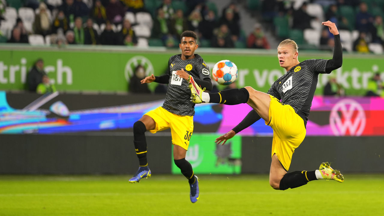 Erling Haaland of Borussia Dortmund scoring their third goal during Wolfsburg against Borussia Doutmund, Bundesliga, at Volkswagen stadium, Wolfsburg, Germany on November 27, 2021.