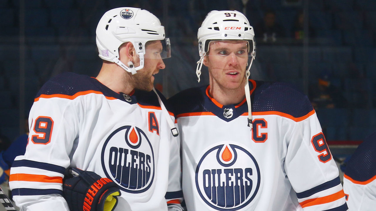 BUFFALO, NY - NOVEMBER 12: Leon Draisaitl #29 and Connor McDavid #97 of the Edmonton Oilers warmup prior to an NHL game against the Buffalo Sabres on November 12, 2021 at KeyBank Center in Buffalo, New York.