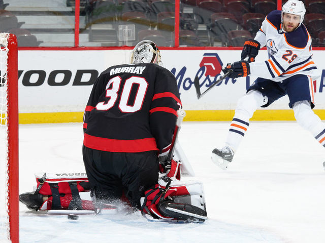 OTTAWA, ON - FEBRUARY 8: Leon Draisaitl #29 of the Edmonton Oilers shoots the puck past Matt Murray #30 of the Ottawa Senators for his second period goal at Canadian Tire Centre on February 8, 2021 in Ottawa, Ontario, Canada.