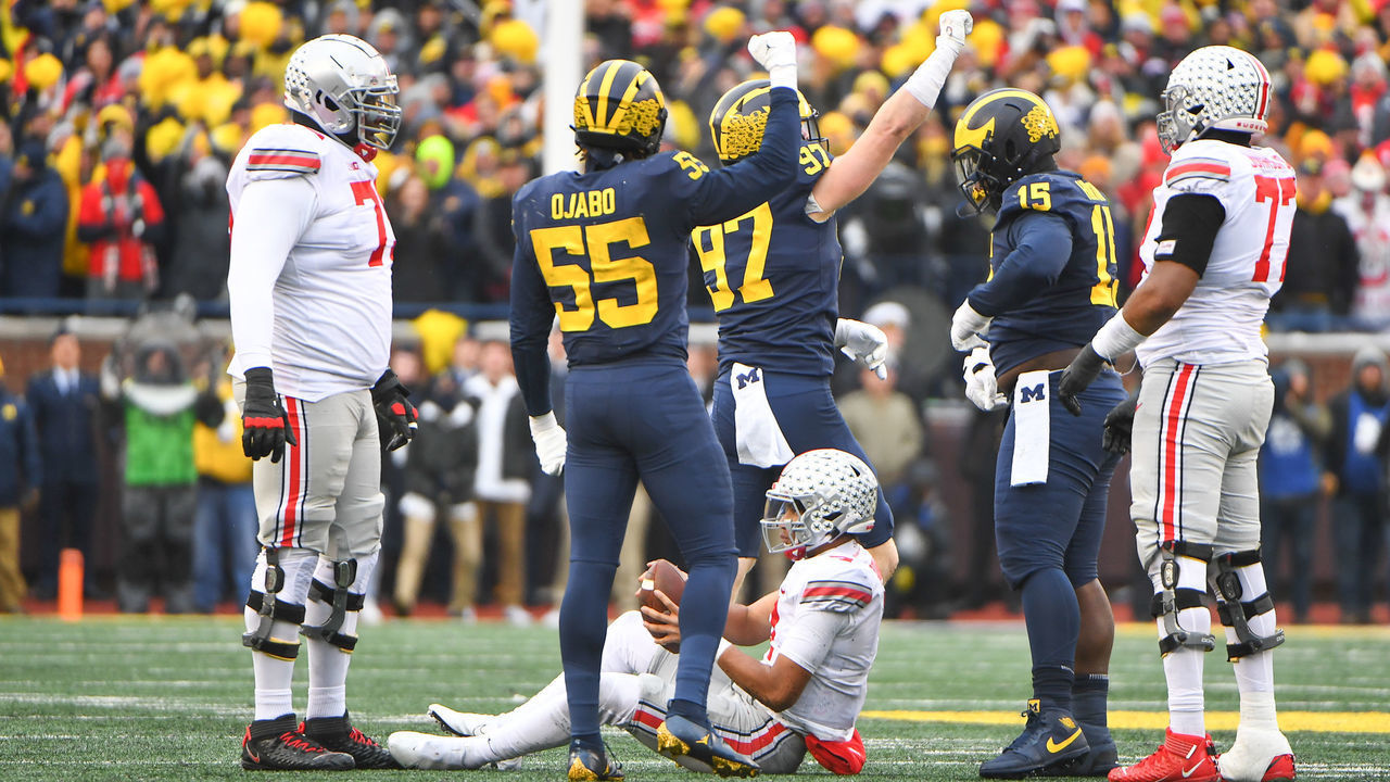 ANN ARBOR, MI - NOVEMBER 27: Michigan Wolverines defensive end Aidan Hutchinson (97) celebrates a sack of Ohio State Buckeyes quarterback C.J. Stroud (7) during The Michigan Wolverines vs the Ohio State Buckeyes game on Saturday November 27, 2021 at Michigan Stadium in Ann Arbor, MI.
