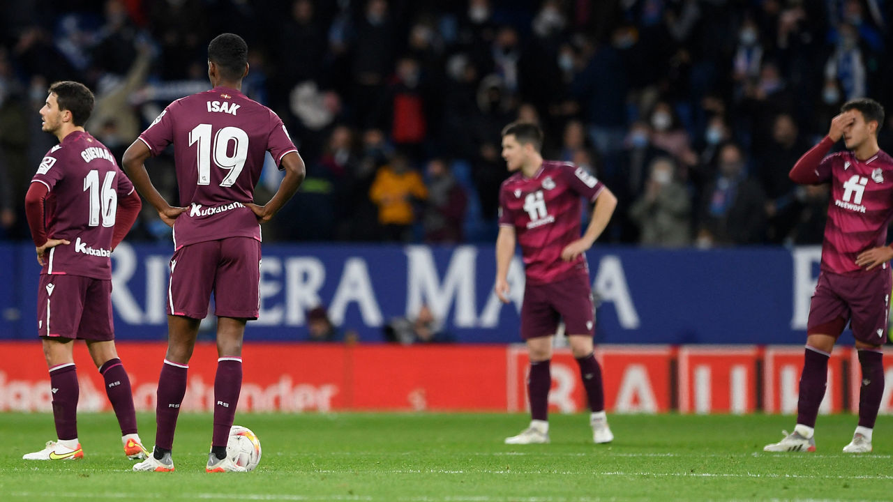 Real Sociedad's Swedish forward Alexander Isak and teammates react to Espanyol's goal during the Spanish league football match between RCD Espanyol and Real Sociedad at the RCDE Stadium in Cornella de Llobregat on November 28, 2021.