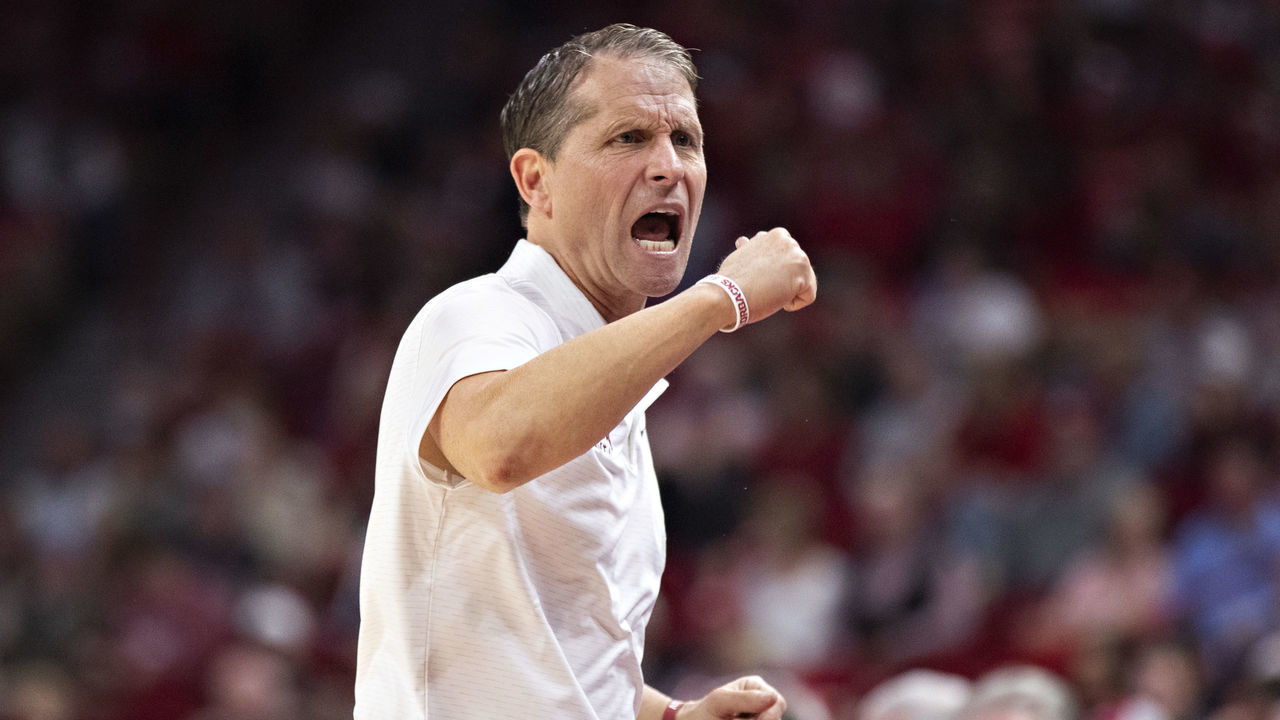 FAYETTEVILLE, ARKANSAS - NOVEMBER 28: Head coach Eric Musselman of the Arkansas Razorbacks yells at his team against the Pennsylvania Quakers at Bud Walton Arena on November 28, 2021 in Fayetteville, Arkansas. The Razorbacks defeated the Quakers 76-60.