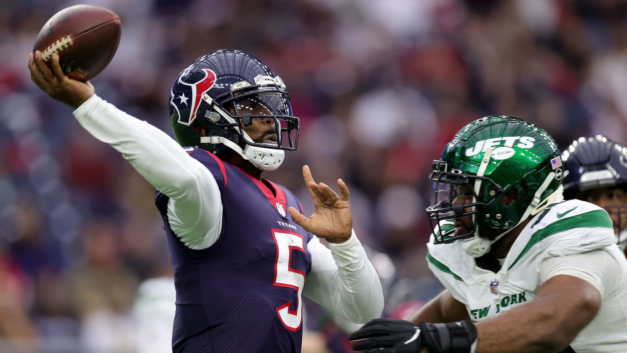 HOUSTON, TEXAS - NOVEMBER 28: Tyrod Taylor #5 of the Houston Texans throws the ball down the field in the second quarter against the New York Jets at NRG Stadium on November 28, 2021 in Houston, Texas.