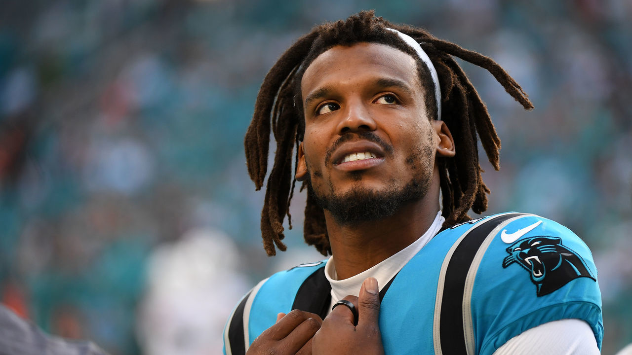 MIAMI GARDENS, FLORIDA - NOVEMBER 28: Cam Newton #1 of the Carolina Panthers looks on from the sidelines during the fourth quarter against the Miami Dolphins at Hard Rock Stadium on November 28, 2021 in Miami Gardens, Florida.