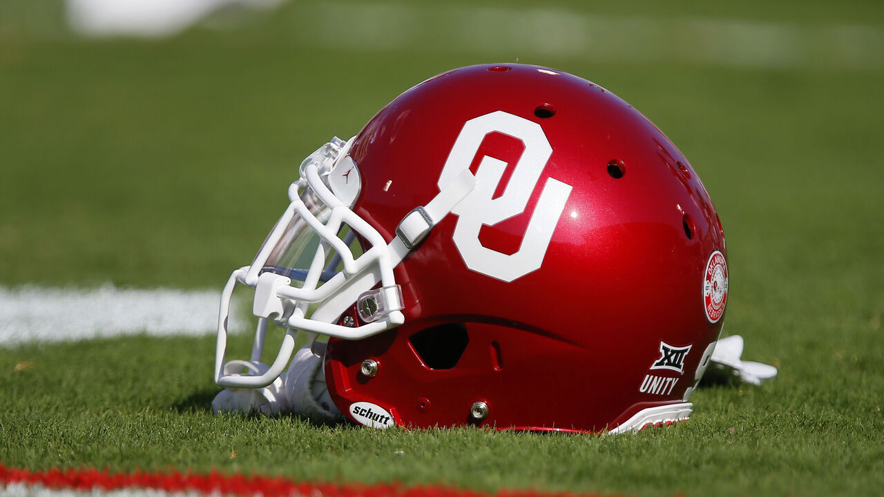 NORMAN, OK - SEPTEMBER 18: An Oklahoma Sooners helmet sits on the field before a game against the Nebraska Cornhuskers at Gaylord Family Oklahoma Memorial Stadium on September 18, 2021 in Norman, Oklahoma. Oklahoma won 23-16.