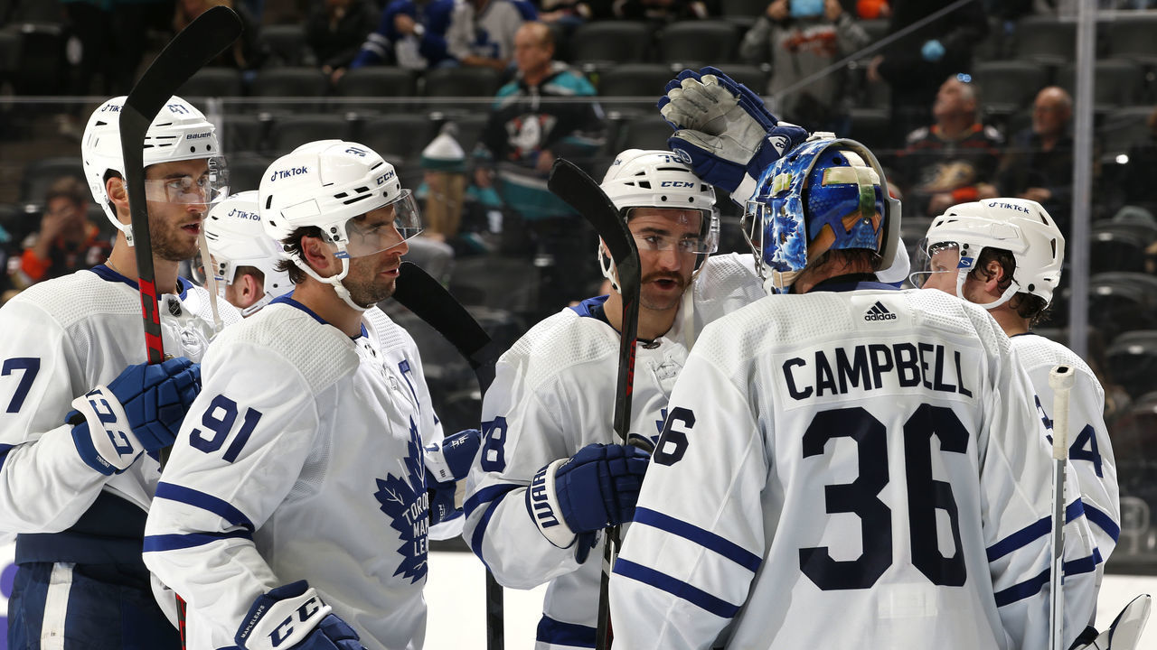 ANAHEIM, CA - NOVEMBER 28: Jack Campbell #36 of the Toronto Maple Leafs celebrate their win with teammates against the Anaheim Ducks at Honda Center on November 28, 2021 in Anaheim, California.