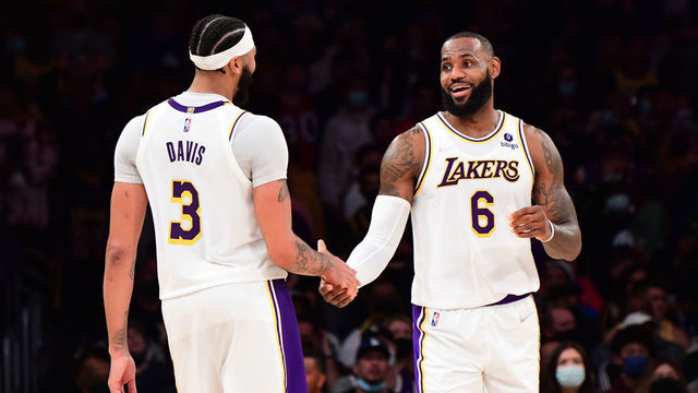 LOS ANGELES, CA - NOVEMBER 28: Anthony Davis #3 of the Los Angeles Lakers high fives LeBron James #6 of the Los Angeles Lakers during the game against the Detroit Pistons on November 28, 2021 at STAPLES Center in Los Angeles, California. NOTE TO USER: User expressly acknowledges and agrees that, by downloading and/or using this Photograph, user is consenting to the terms and conditions of the Getty Images License Agreement. Mandatory Copyright Notice: Copyright 2021 NBAE