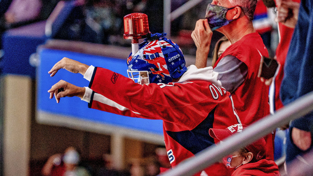 WASHINGTON, DC - OCTOBER 19: Caps fans salute a late open net goal by Washington Capitals Left Wing Alex Ovechkin (8) during a NHL game between the Washington Capitals and the Colorado Avalanche on October 19, 2021, at Capital One Arena, in Washington, D.C.