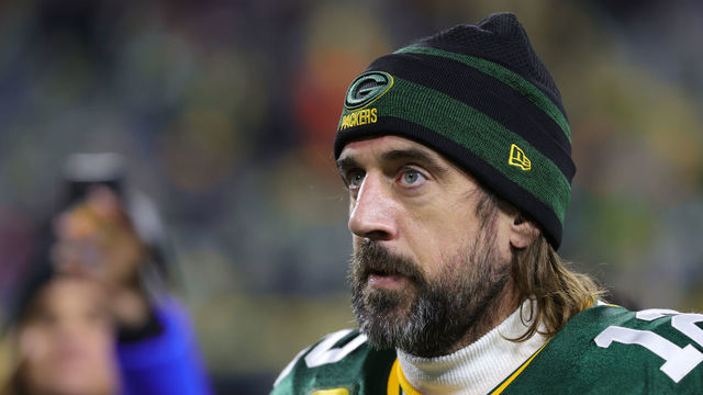 GREEN BAY, WISCONSIN - NOVEMBER 28: Aaron Rodgers #12 of the Green Bay Packers walks off the field after defeating the Los Angeles Rams 36-28 at Lambeau Field on November 28, 2021 in Green Bay, Wisconsin.