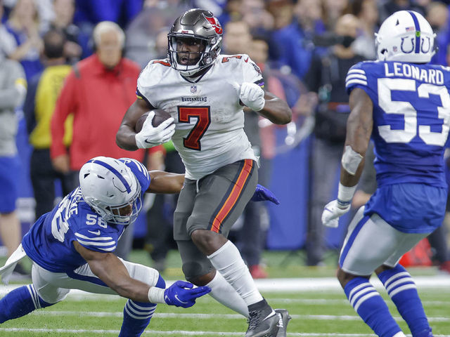 INDIANAPOLIS, IN - NOVEMBER 28: Leonard Fournette #7 of the Tampa Bay Buccaneers runs the ball during the game against the Indianapolis Colts at Lucas Oil Stadium on November 28, 2021 in Indianapolis, Indiana.