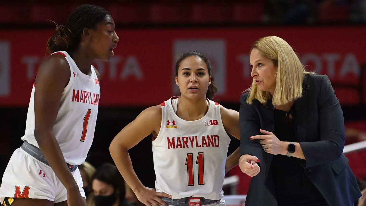 COLLEGE PARK, MD - NOVEMBER 18: Maryland Terrapins head coach Brenda Frese talks with Maryland Terrapins guard Diamond Miller (1) and Maryland Terrapins guard Katie Benzan (11) in the first half at Xfinity Center November 18, 2021 in College Park, MD. The Maryland Terrapins beat the UNC Wilmington Seahawks 108-66.