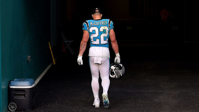 MIAMI GARDENS, FLORIDA - NOVEMBER 28: Christian McCaffrey #22 of the Carolina Panthers walks back to the locker room after Carolina was defeated by Miami 33-10 at Hard Rock Stadium on November 28, 2021 in Miami Gardens, Florida.
