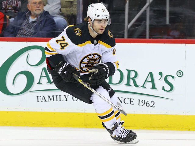 NEWARK, NJ - NOVEMBER 13: Boston Bruins left wing Jake DeBrusk (74) skates during the National Hockey League game between the New Jersey Devils and the Boston Bruins on November 13, 2021 at the Prudential Center in Newark, NJ.