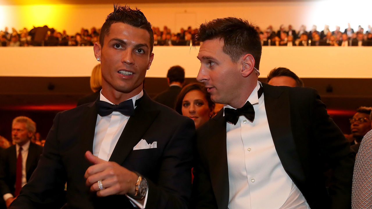 ZURICH, SWITZERLAND - JANUARY 11: FIFA Ballon d'Or nominee Cristiano Ronaldo of Portugal and Real Madrid sits with FIFA Ballon d'Or nominee Lionel Messi of Argentina and Barcelona during the FIFA Ballon d'Or Gala 2015 at the Kongresshaus on January 11, 2016 in Zurich, Switzerland.