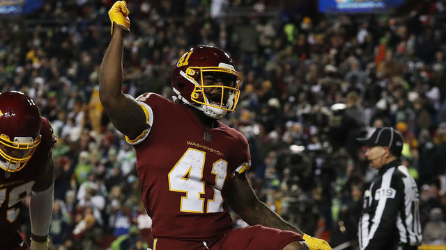 LANDOVER, MARYLAND - NOVEMBER 29: J.D. McKissic #41 of the Washington Football Team reacts after scoring a touchdown against the Seattle Seahawks during the third quarter at FedExField on November 29, 2021 in Landover, Maryland.