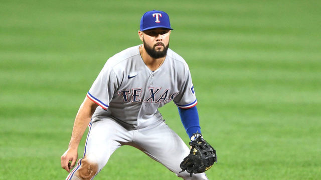 BALTIMORE, MD - SEPTEMBER 24: Isiah Kiner-Falefa #9 of the Texas Rangers in position during a baseball game against the Baltimore Orioles at Oriole Park at Camden Yards on September 24, 2021 in Baltimore, Maryland.