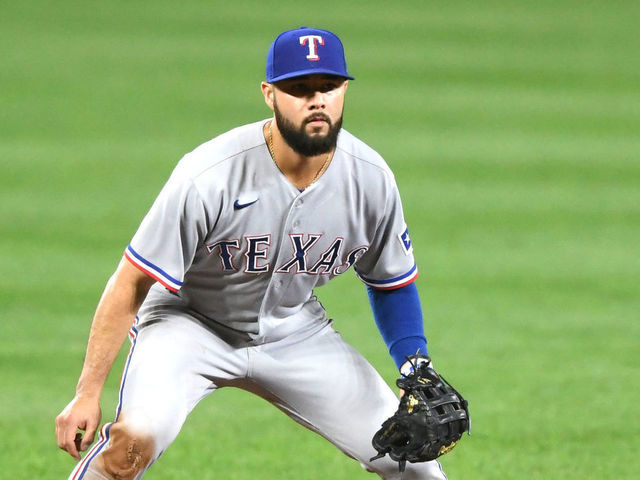 BALTIMORE, MD - SEPTEMBER 24: Isiah Kiner-Falefa #9 of the Texas Rangers in position during a baseball game against the Baltimore Orioles at Oriole Park at Camden Yards on September 24, 2021 in Baltimore, Maryland.