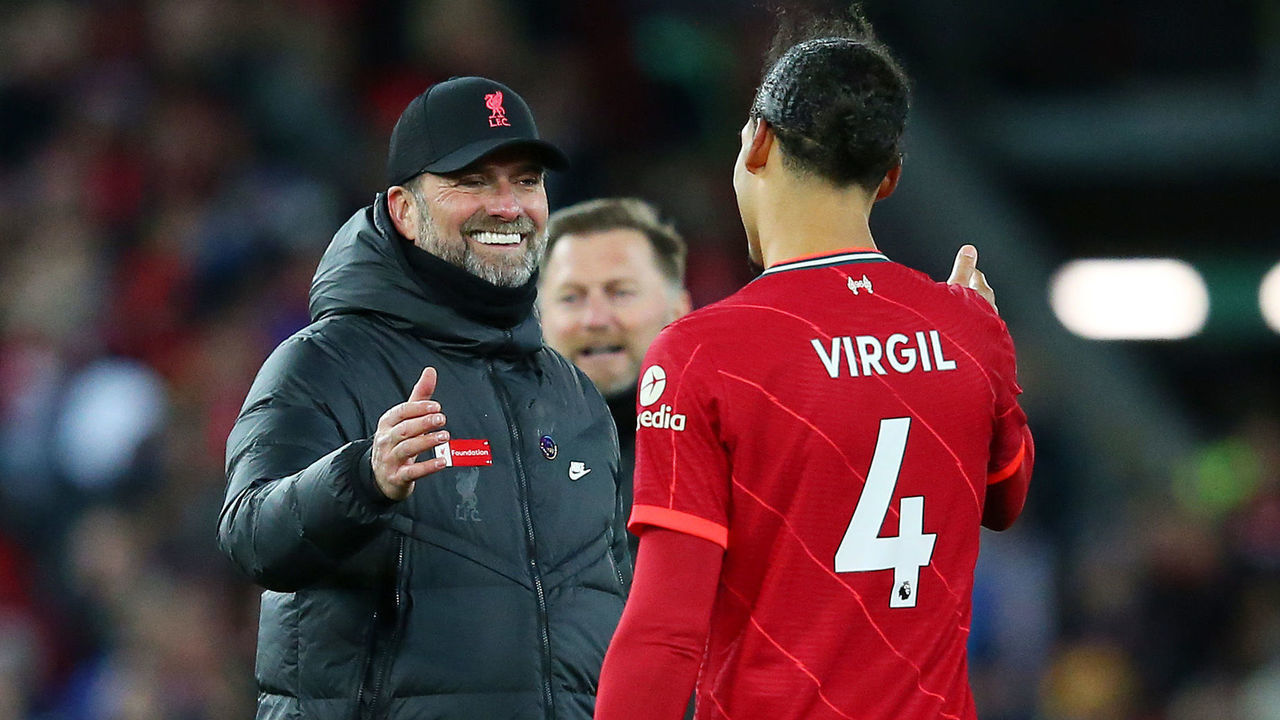 LIVERPOOL, ENGLAND - NOVEMBER 27: Jurgen Klopp, Manager of Liverpool celebrates with Virgil van Dijk after victory in the Premier League match between Liverpool and Southampton at Anfield on November 27, 2021 in Liverpool, England.