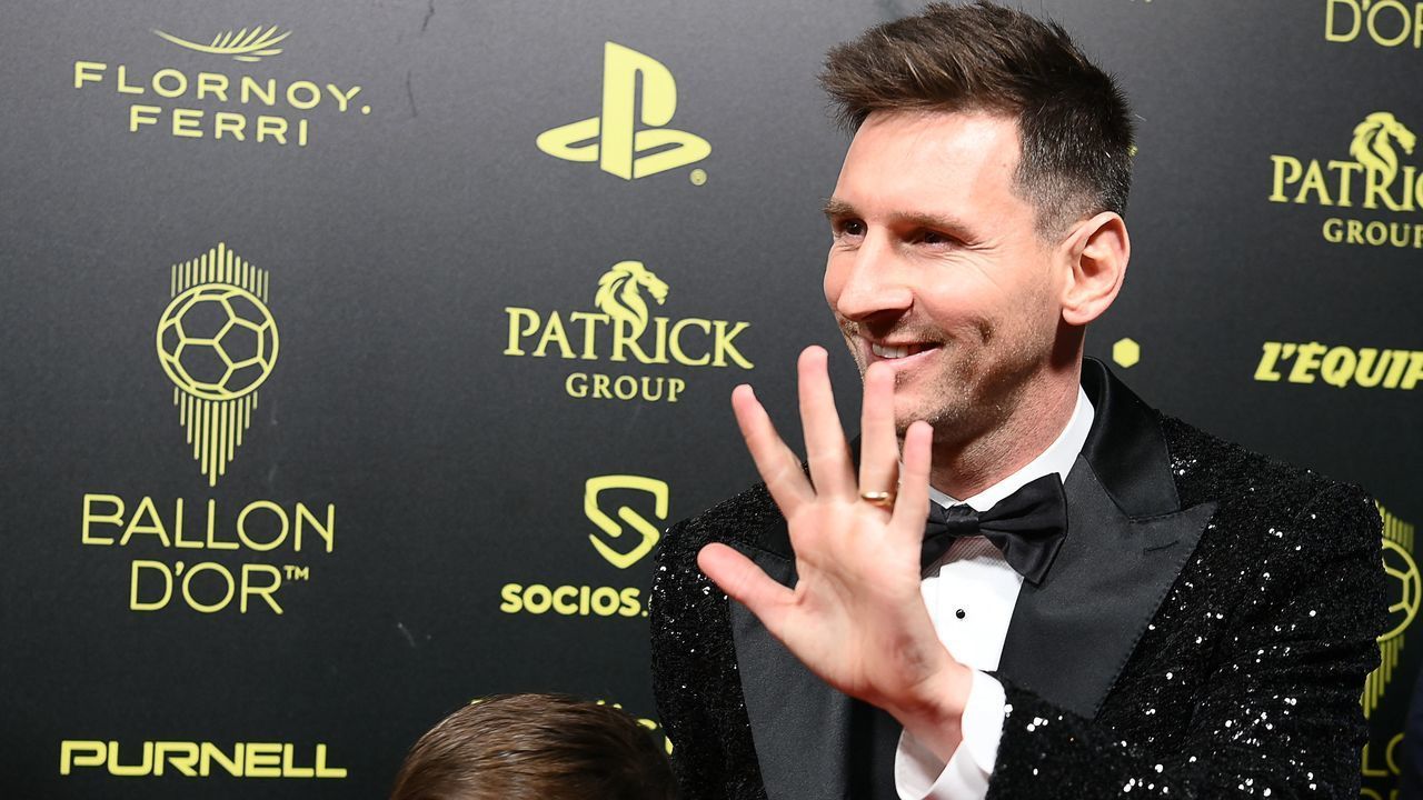 Paris Saint-Germain's Argentine forward Lionel Messi poses upon arrival to attend the 2021 Ballon d'Or France Football award ceremony at the Theatre du Chatelet in Paris on November 29, 2021.