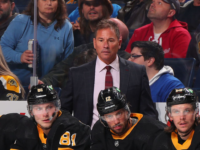 BUFFALO, NY - OCTOBER 22: Head coach Bruce Cassidy of the Boston Bruins watches the action against the Buffalo Sabres during an NHL game on October 22, 2021 at KeyBank Center in Buffalo, New York.