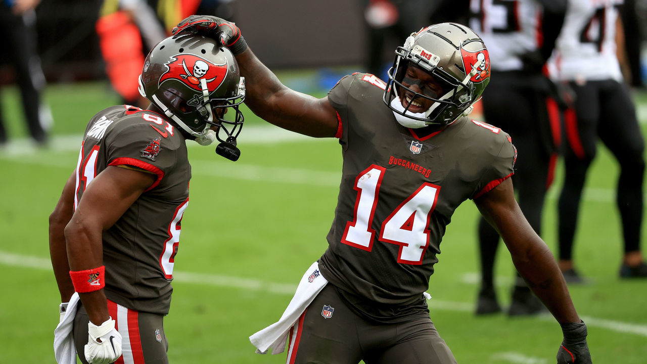 TAMPA, FLORIDA - JANUARY 03: Antonio Brown #81 of the Tampa Bay Buccaneers celebrates a touchdown with Chris Godwin #14 during a game against the Atlanta Falcons at Raymond James Stadium on January 03, 2021 in Tampa, Florida.